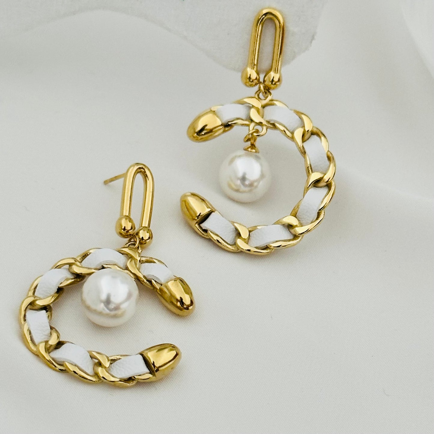 Boucle d'oreille CH